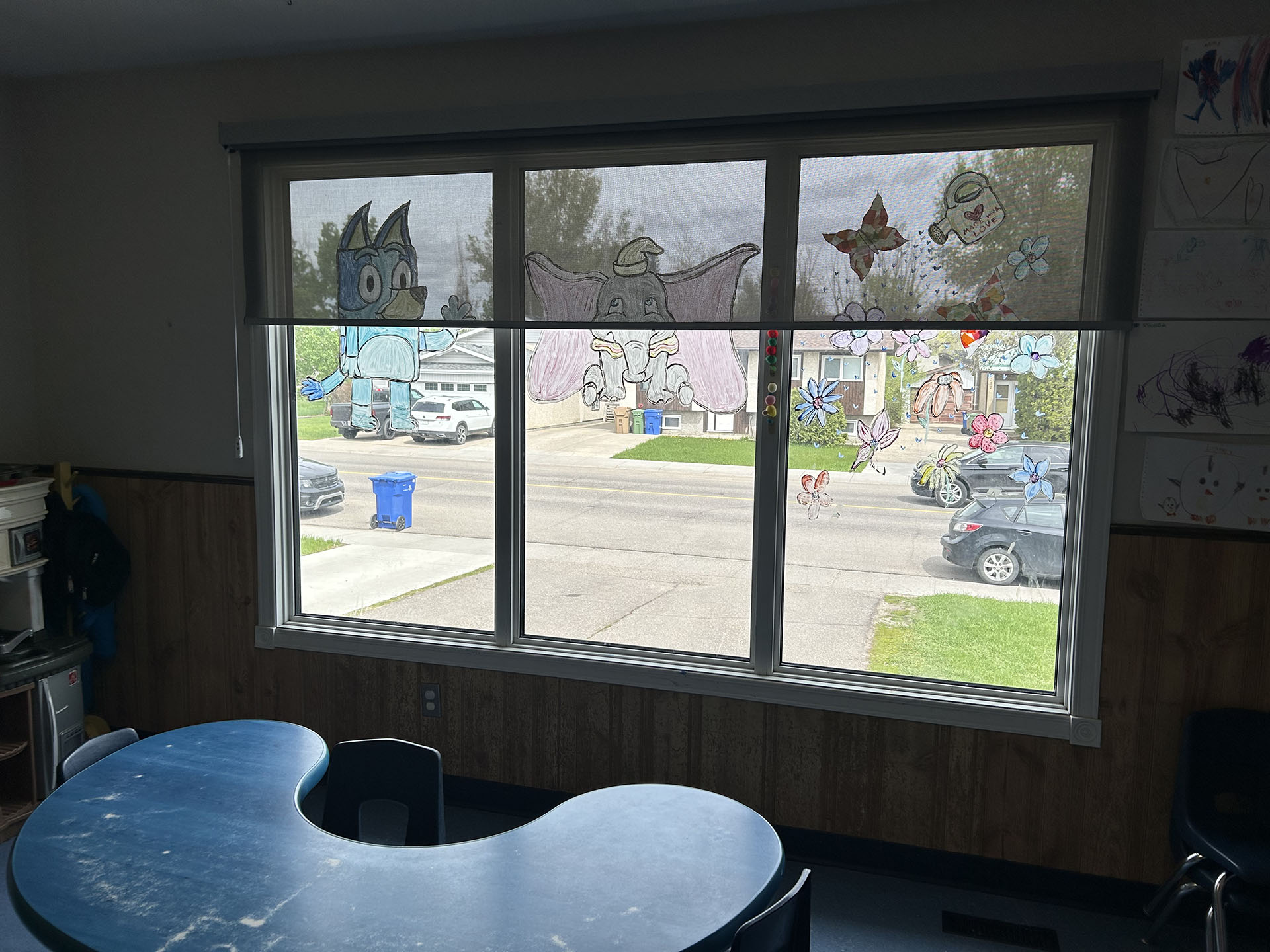 Classroom Window with Solar Roller Shade and Character Art