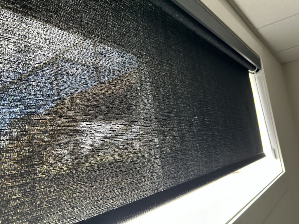 Close-Up View of Dark Woven Solar Shade Texture