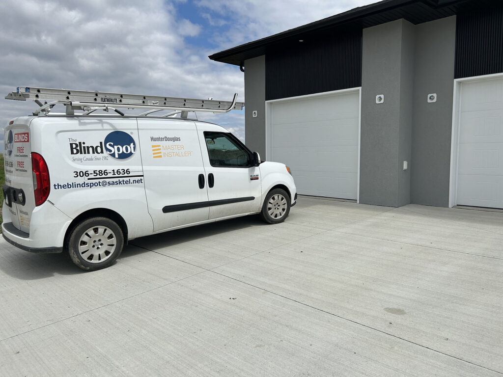 Company Work Van Parked Outside Newly Built Commercial Building