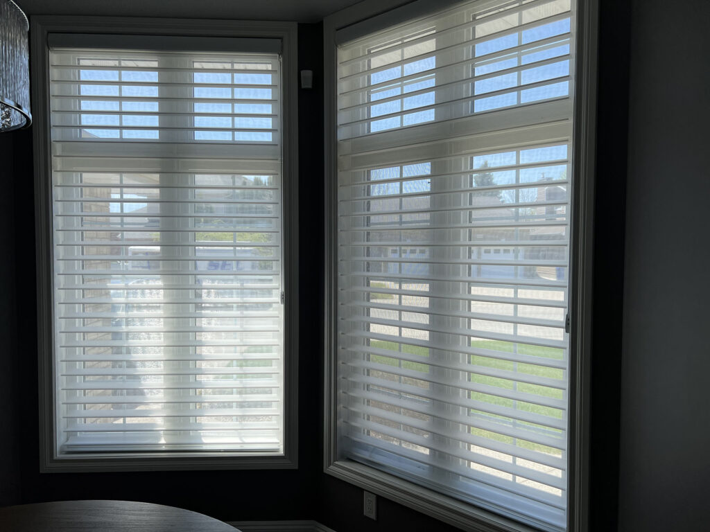 Dual Motorized Horizontal Sheer Shades in Corner Windows