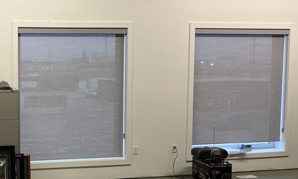 Dual Office Windows with Matching Solar Roller Shades