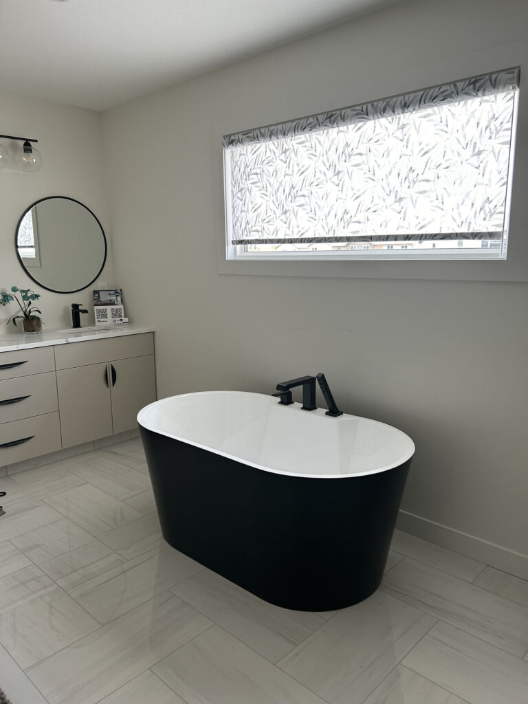 Modern Bathroom Suite with Freestanding Tub and Botanical Printed Roller Shade