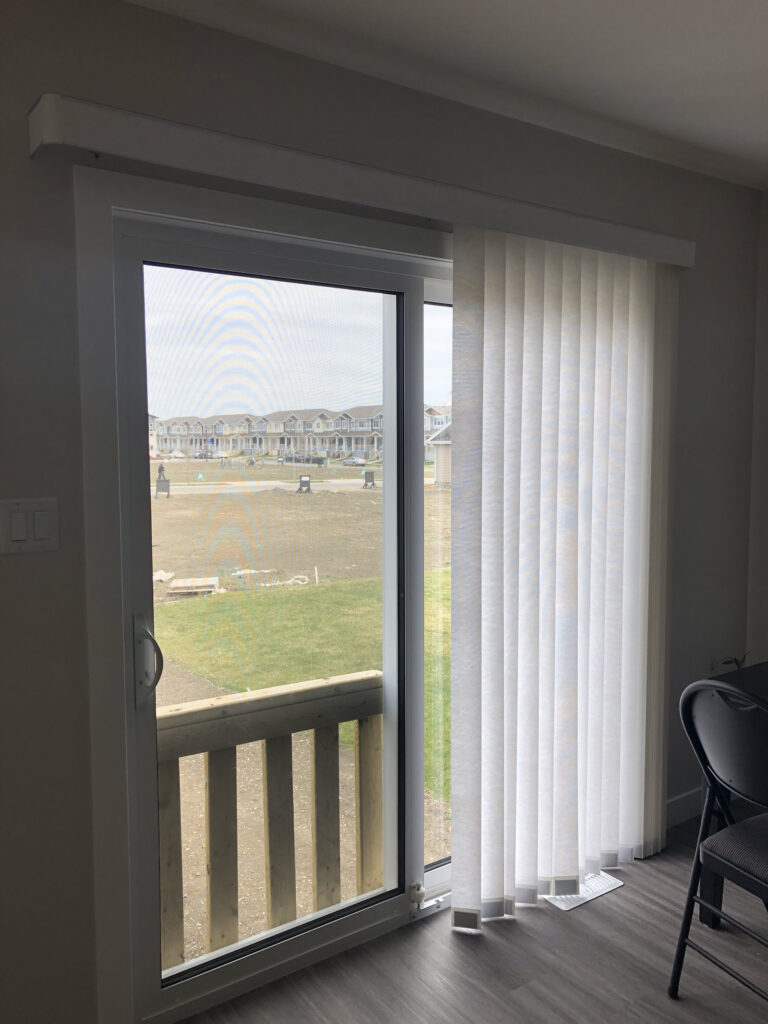 Sliding Glass Door with Vertical Sheer Blinds Pull Back to One Side