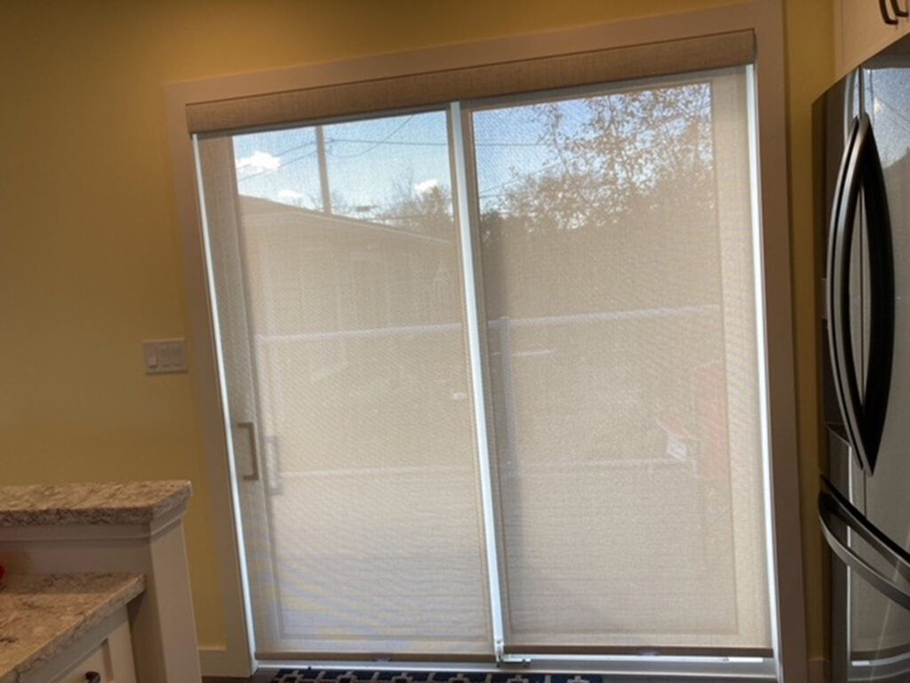 Sliding Patio Door with Dual Panel Solar Roller Shades